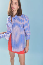 Load image into Gallery viewer, woman in Blue &amp; Orange Stripe Cotton Shirt untucked from shirt and sleeves rolled to her elbows 
