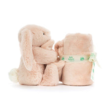 Load image into Gallery viewer, Jellycat Bashful Blush Bunny Soother with the blanket rolled and tied with a bow side view
