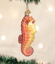 Load image into Gallery viewer, Old World Christmas Orange Seahorse Ornament
