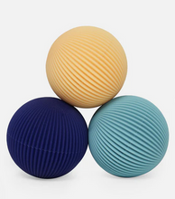 Load image into Gallery viewer, Three textured balls in beige, blue, and green on a white background
