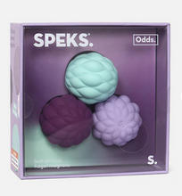 Load image into Gallery viewer, Three textured balls in green, purple, and lavender on a purple Speks packaging.

