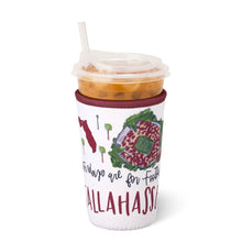 Load image into Gallery viewer, Swig Saturdays In Tallahassee Iced Cup Coolie holding an iced coffee cup
