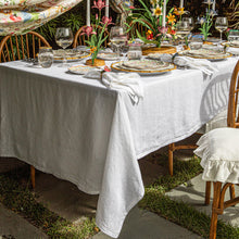 Load image into Gallery viewer, Juliska Berry Scallop 60" x 120" Tablecloth - White on a table set with Sofia place settings
