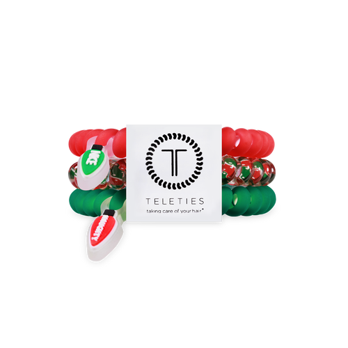 TELETIES Spiral Hair Coils Naughty or Nice Hair Ties in green with naughty tag, red with nice tag and  green and red.