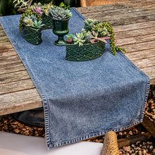 Load image into Gallery viewer, Juliska Denim 18" x 90" Table Runner - Blue on an outdoor table with plant holders
