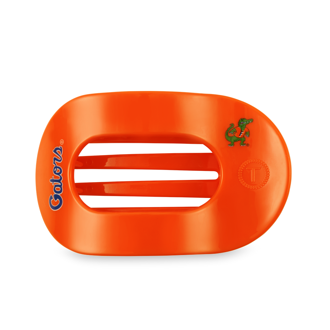 orange hair clip with gator logo and mascot 