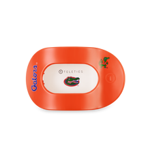 Load image into Gallery viewer, orange hair clip with gator mascot and logo
