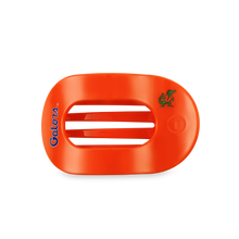 Load image into Gallery viewer, orange hair clip with gator mascot and logo
