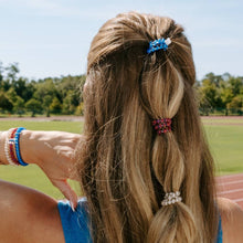Load image into Gallery viewer, person wearing Three gator themed hair ties

