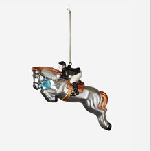 Load image into Gallery viewer, Two ornaments - one  is a horse with rider jumping the second is two racing horses with jockey riders 
