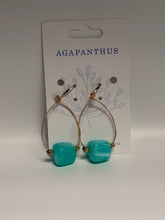 Load image into Gallery viewer, Turquoise earrings on a white card with 'Agapanthus' branding.
