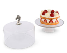 Load image into Gallery viewer, Vagabond House Horse Glass Covered Cake done sitting next to glass stand with a cake 
