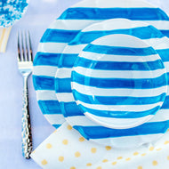 White plates and bowls with blue stripes