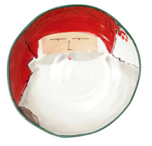 Load image into Gallery viewer, wide shallow bowl with a painted image of Santa in a hat with  red trim
