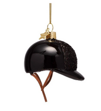 Load image into Gallery viewer, A glossy black equestrian helmet Christmas ornament with a textured black glittery side panel, brown leather-style chin strap, and gold hanging hardware.
