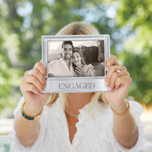 Load image into Gallery viewer, person with an engagement ring on holding a Mariposa Engaged Signature 4x6 Frame
