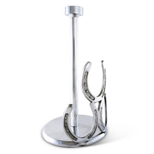 Load image into Gallery viewer, Paper Towel Holder decorated with three horseshoes in a silver color metal and a tall center rod to hold a roll of paper towels - side view to show the curve of the horse shoes
