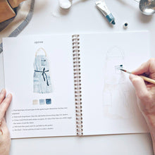 Load image into Gallery viewer, person painting an apron
