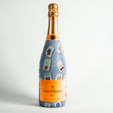Load image into Gallery viewer, Champagne Bottle covered with the Pastel Blue Mahjong Champagne Bottle Wrap
