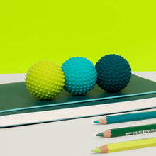 Load image into Gallery viewer, Odds Silicone Fidget Magnets in a desk
