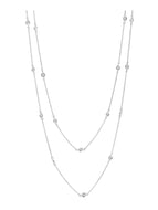 two strands of thin chain interspersed with bezeled cubic zirconia