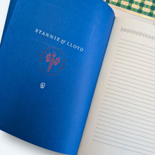 Load image into Gallery viewer, open blue notebook with lined paper
