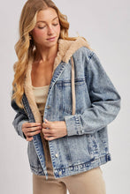 Load image into Gallery viewer, person wearing a Faux Fur Hooded Denim Jacket in a Light Wash
