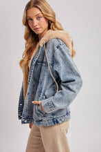 Load image into Gallery viewer, person wearing a Faux Fur Hooded Denim Jacket in a Light Wash
