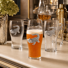 Load image into Gallery viewer, Alligator Beer Pint Glasses on a bar
