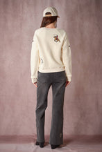 Load image into Gallery viewer, Western Embroidered Knit Top in Nude with embroidered horse motifs back view
