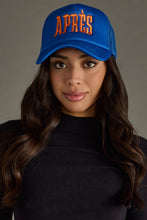 Load image into Gallery viewer, woman wearing a blue hat with orange text Apres
