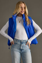 Load image into Gallery viewer, woman in a puffy Classic royal blue Vest paired with a black shirt and jeans

