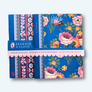 two small notebooks with blue and pink floral covers