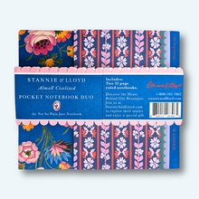 Load image into Gallery viewer, two small notebooks with blue and pink floral covers in branding packaging 
