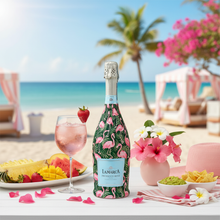 Load image into Gallery viewer, Champagne Bottle covered with the Palm Flamingo Club Prosecco Bottle Wrap on a table set on the beach
