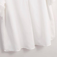 Load image into Gallery viewer, White Relaxed Short Sleeve Blouse close up on hem
