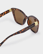 Load image into Gallery viewer, Katie Loxton Mykonos Oversized Cat-Eye Sunglasses side view showing gold accents and gold text along the arms
