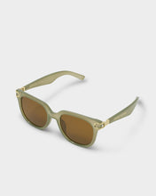 Load image into Gallery viewer, Katie Loxton Manhattan Square square framed Sunglasses with transparent green frames brown lenses and gold accents  side view to show arms with gold lettering 
