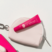 Load image into Gallery viewer, Lip Service Gloss-to-Balm Treatment on a coin purse
