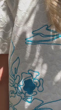Load and play video in Gallery viewer, video of Darby Reversible Embroidery Linen jacket Mineral Blue off white embroidered jacket with close up on embroidery 
