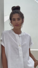 Load and play video in Gallery viewer, video of a woman wearing the Anna Cotton Linen Blouse in White
