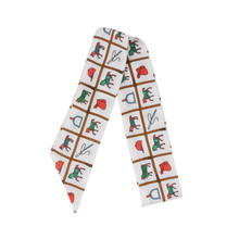 Load image into Gallery viewer, Equestrian Themed Design Skinny Scarf on white with green and orange designs 
