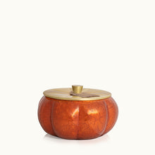 Load image into Gallery viewer, orange pumpkin shaped candle with a gold lid

