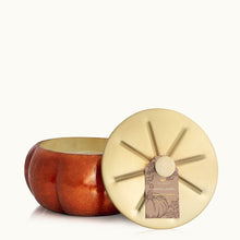 Load image into Gallery viewer, orange pumpkin shaped candle with a gold lid
