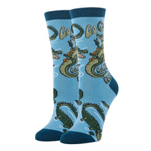 Load image into Gallery viewer, Blue and green socks with images of alligators
