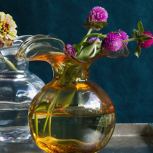 Load image into Gallery viewer, Vietri Hibiscus Amber Glass Bud Vase with flowers
