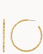large hoop earring with hammered texture set with small crystals
