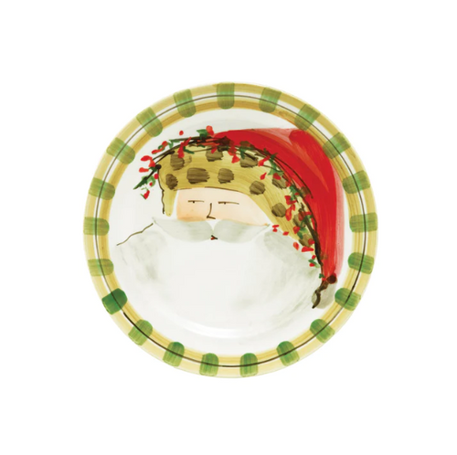Vietri Old St. Nick Round Salad Plate with Santa wearing a hat with animal print trim