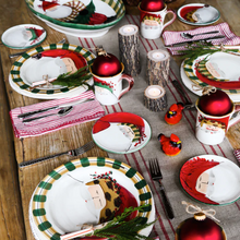 Load image into Gallery viewer, Vietri Old St. Nick plates on a table
