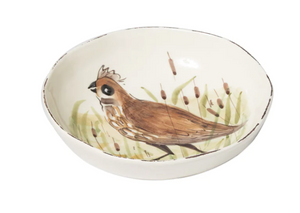 large shallow bowl painted with a  Quail